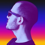 A profile photo of Chris looking upwards to the left, and wearing sunglasses. He looks like a white man with some beard and a bald head.
